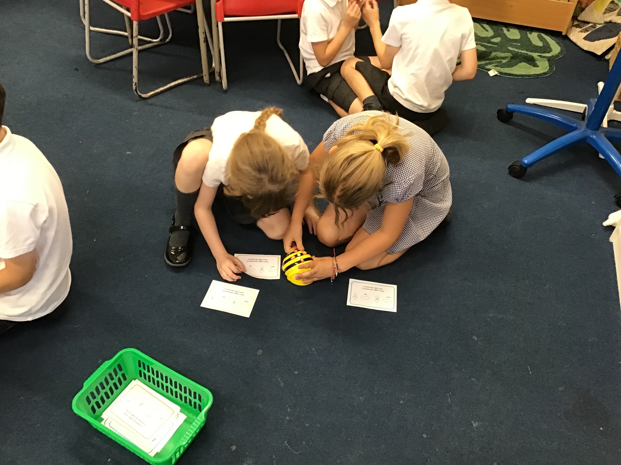 Children using Beebots