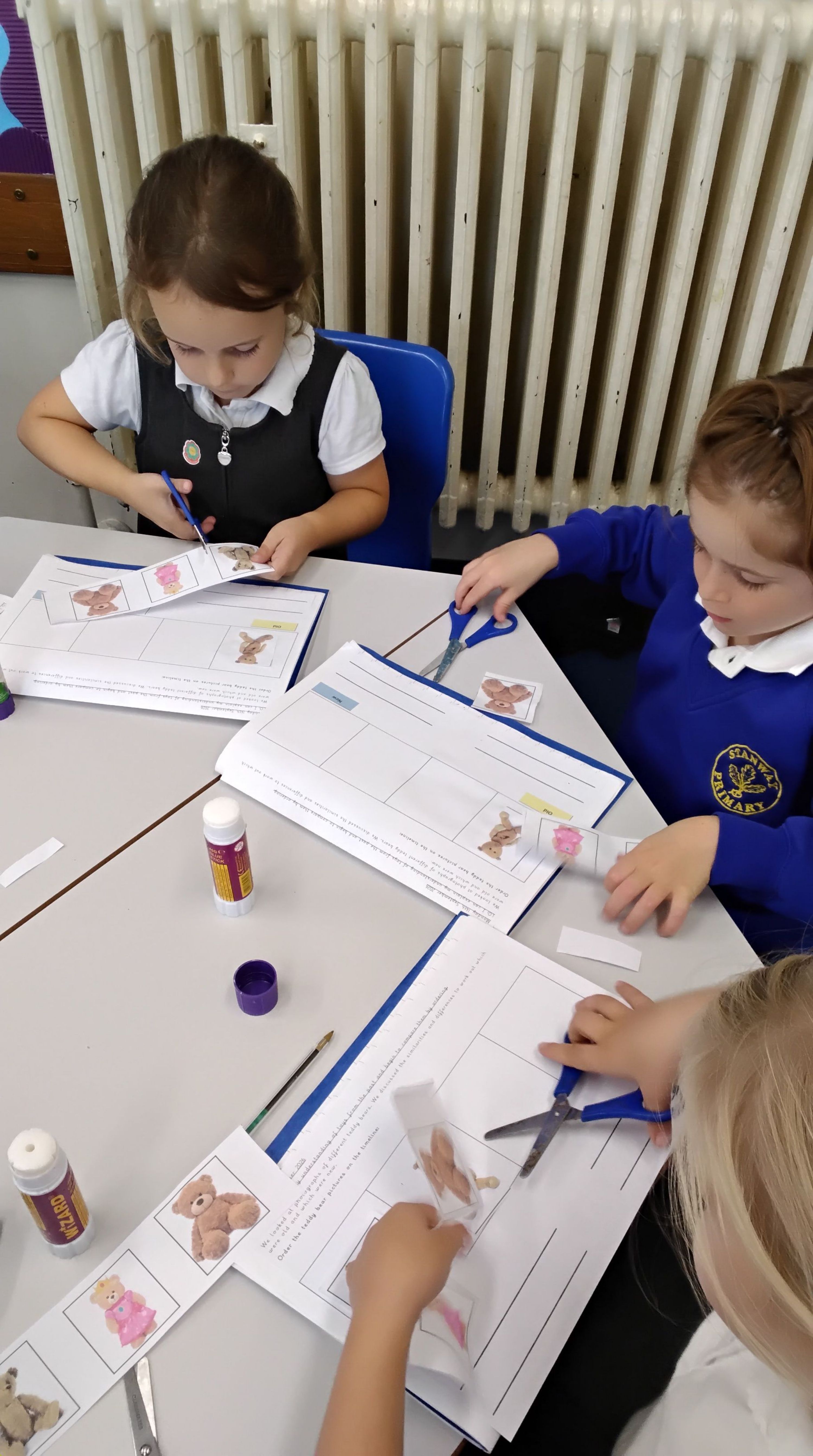 Cutting and sticking teddy bear pictures 
