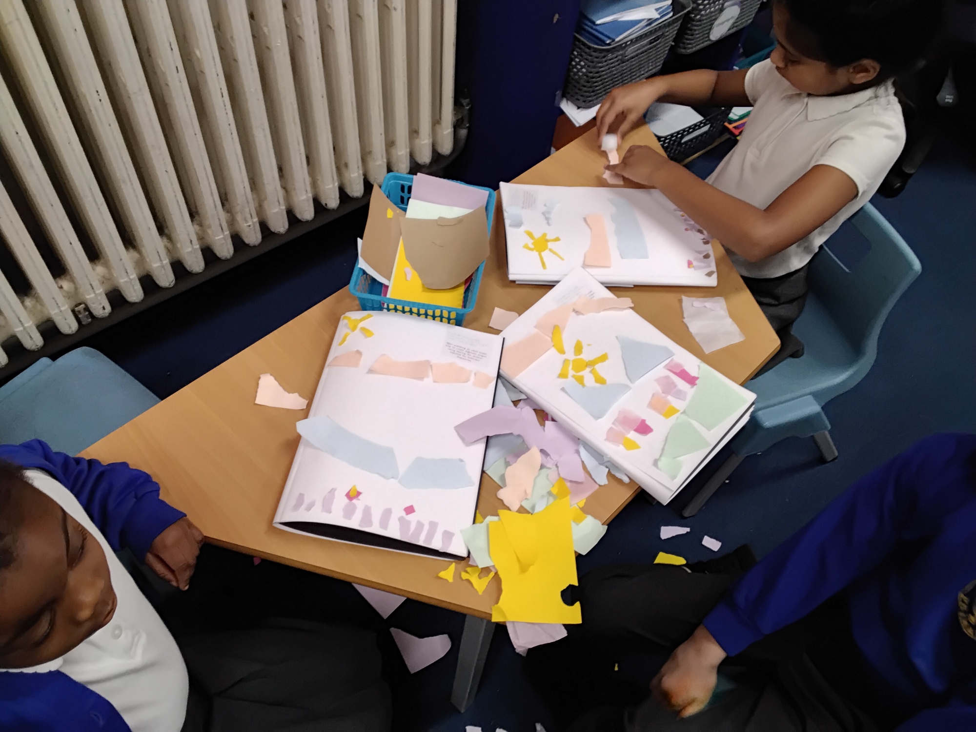 Making pictures by tearing paper Making pictures by tearing paper