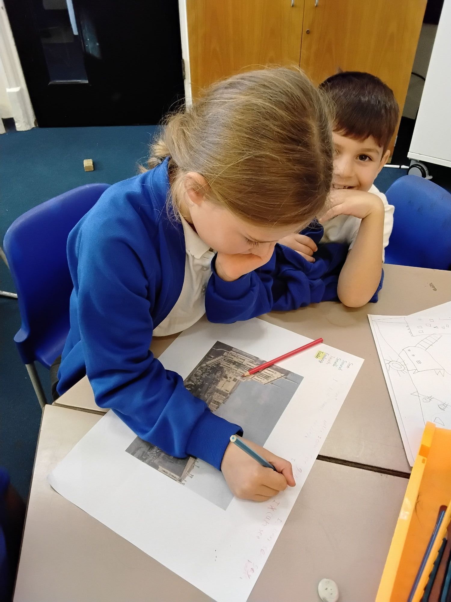 Examining a painting by Canaletto