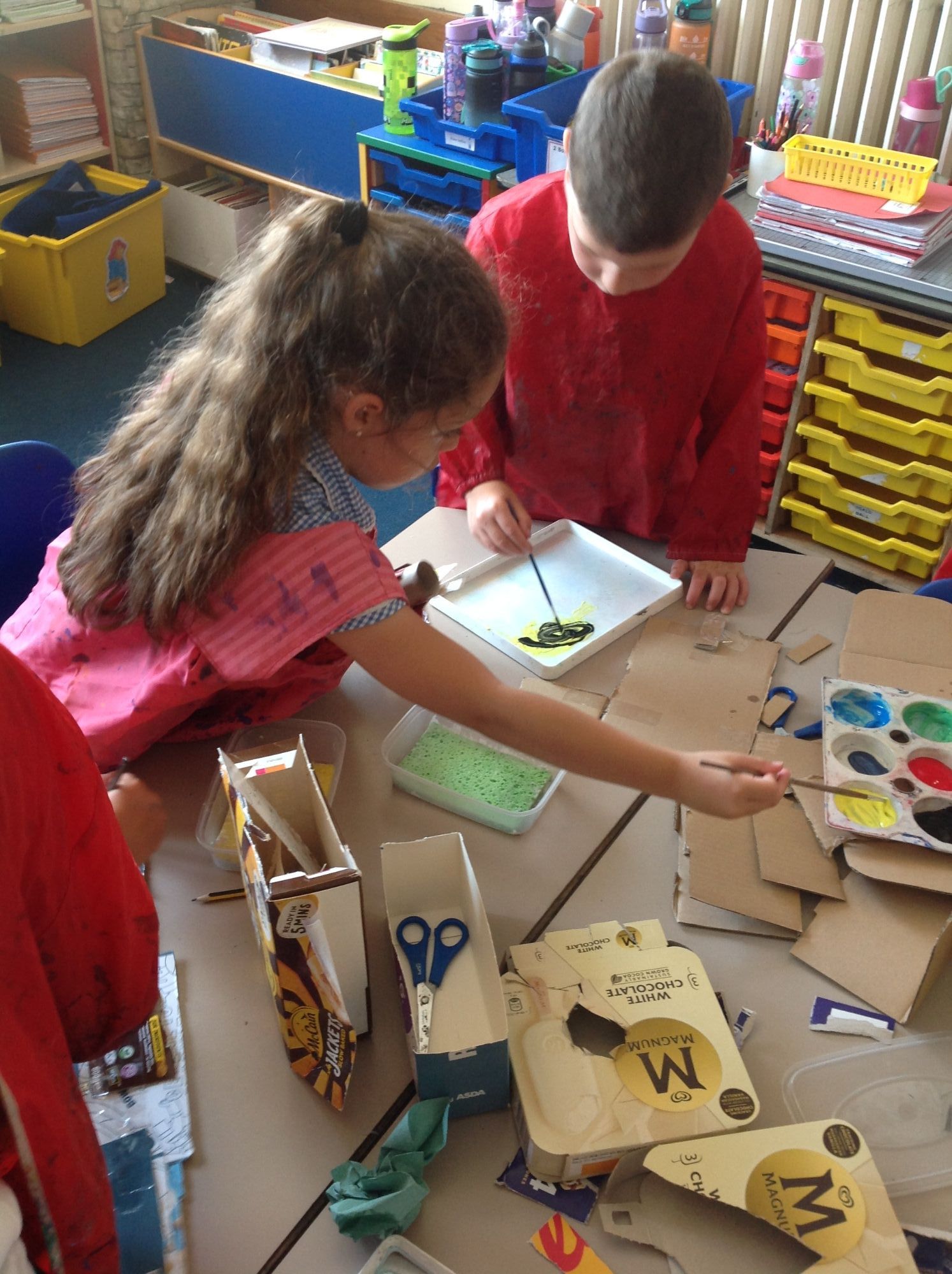 Painting junk model minibeasts in Science