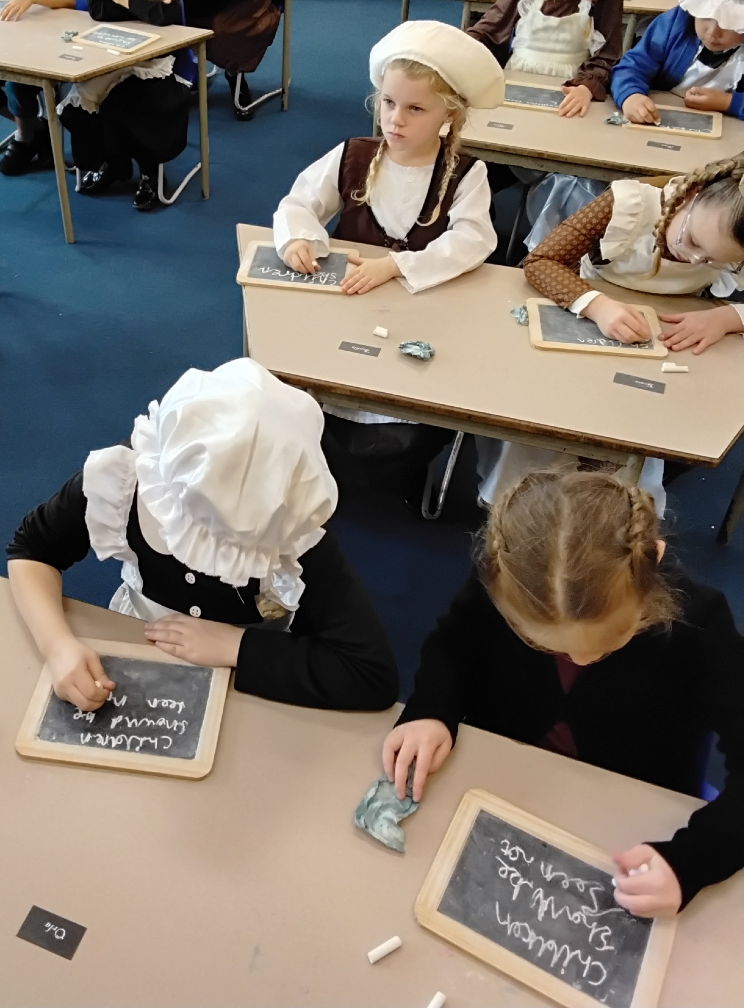 Victorian day - writing on slate boards