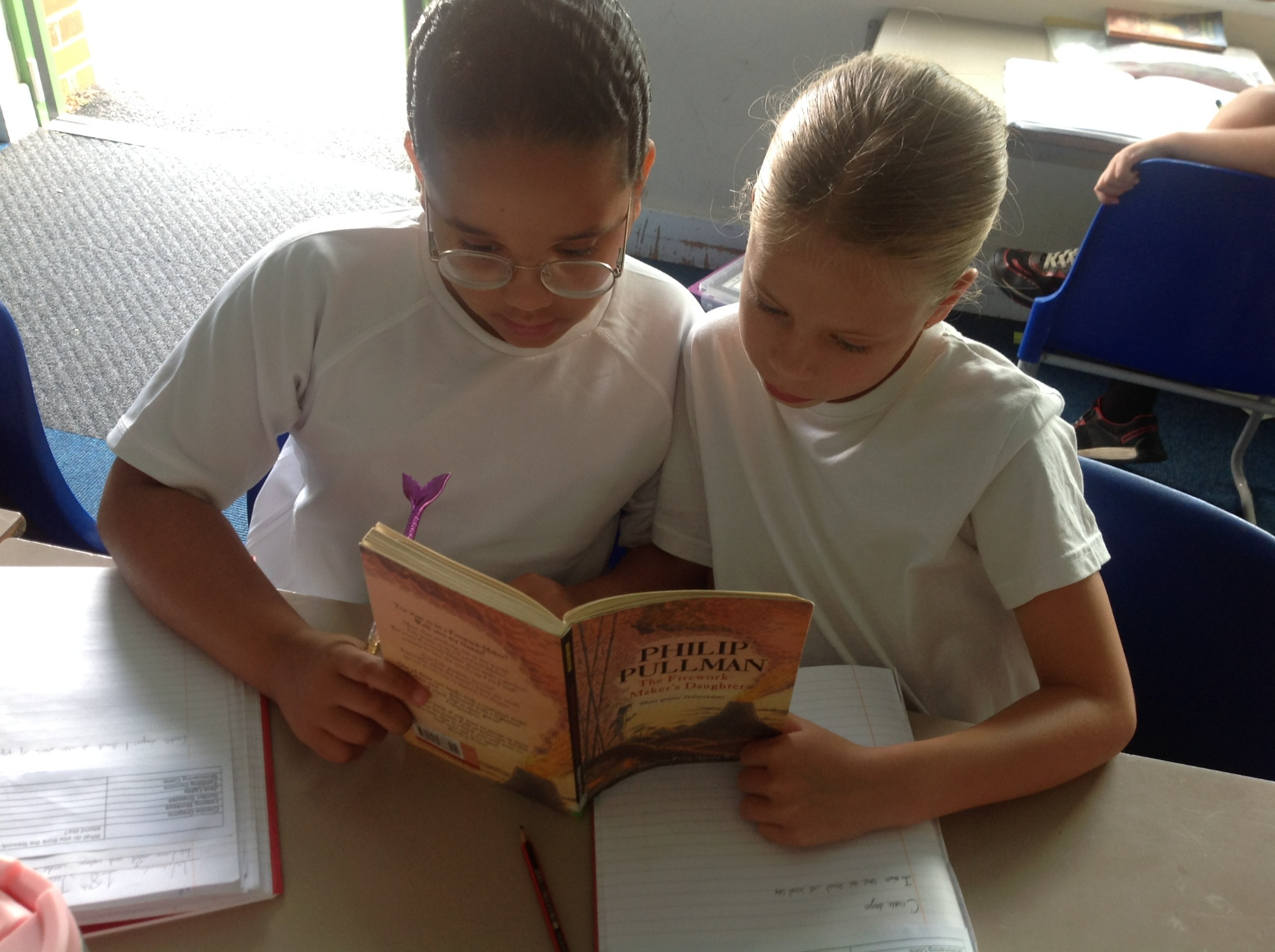 Girls reading a book
