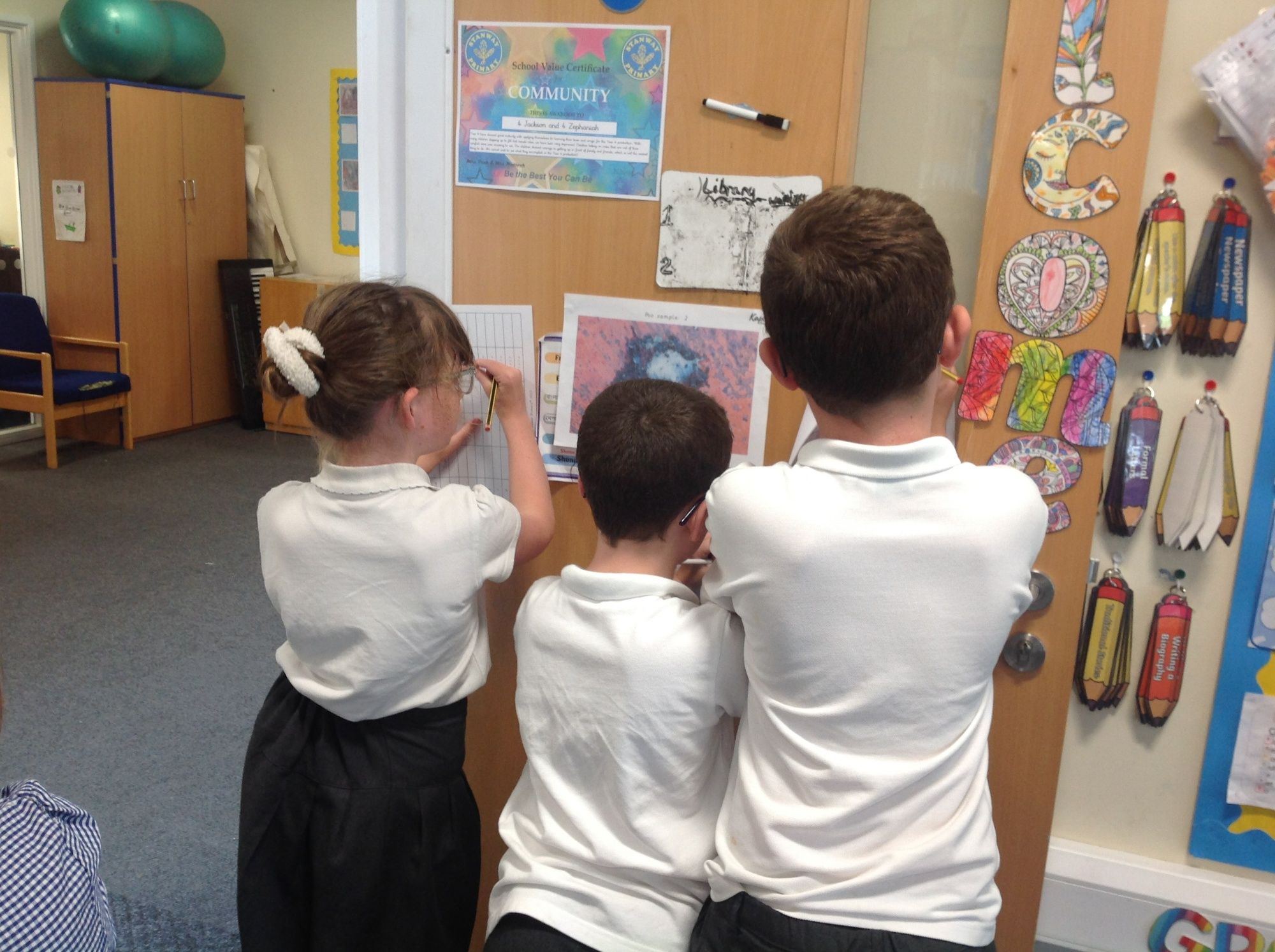 children looking at picture