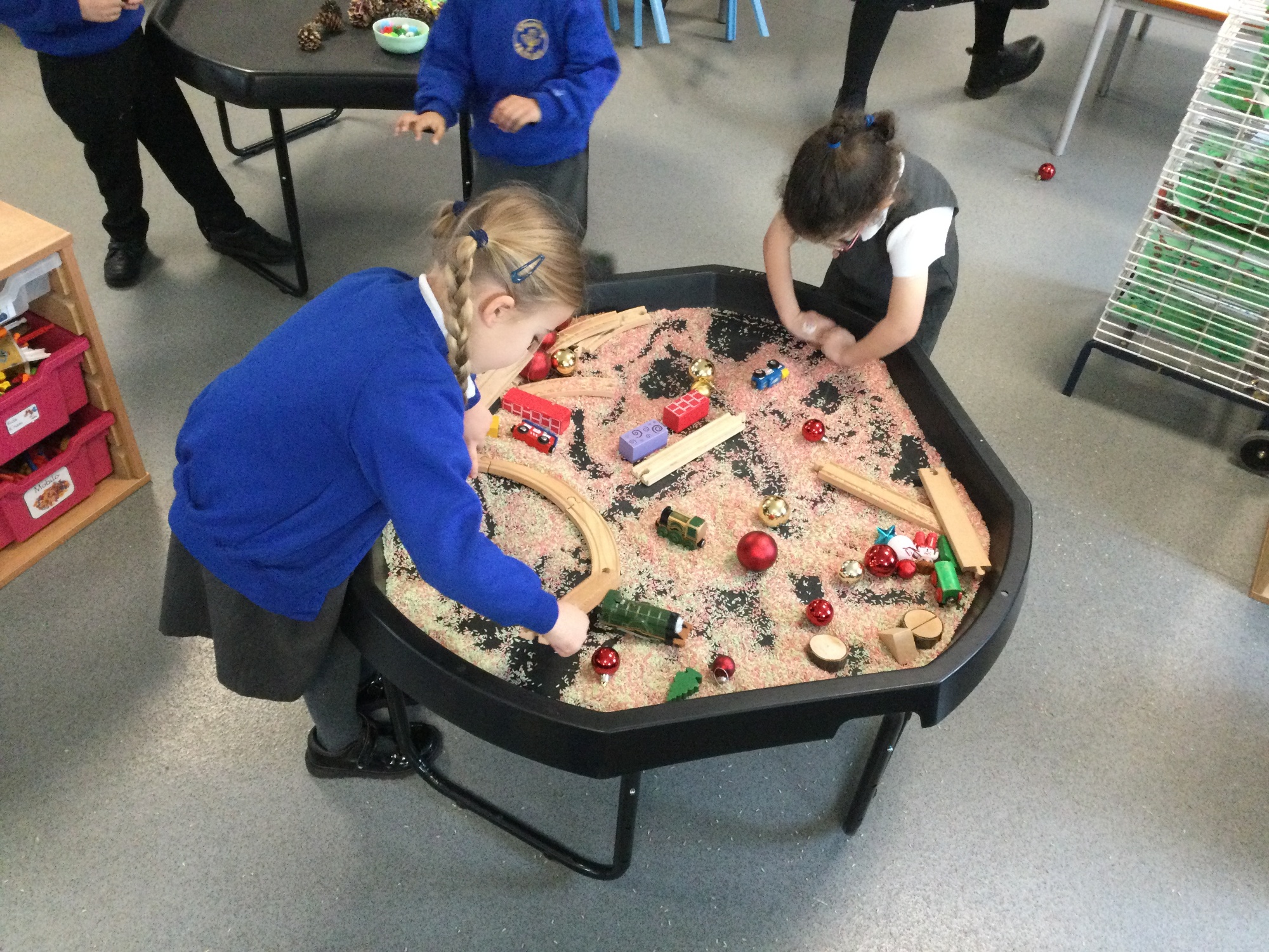 Children playing with sensory tray
