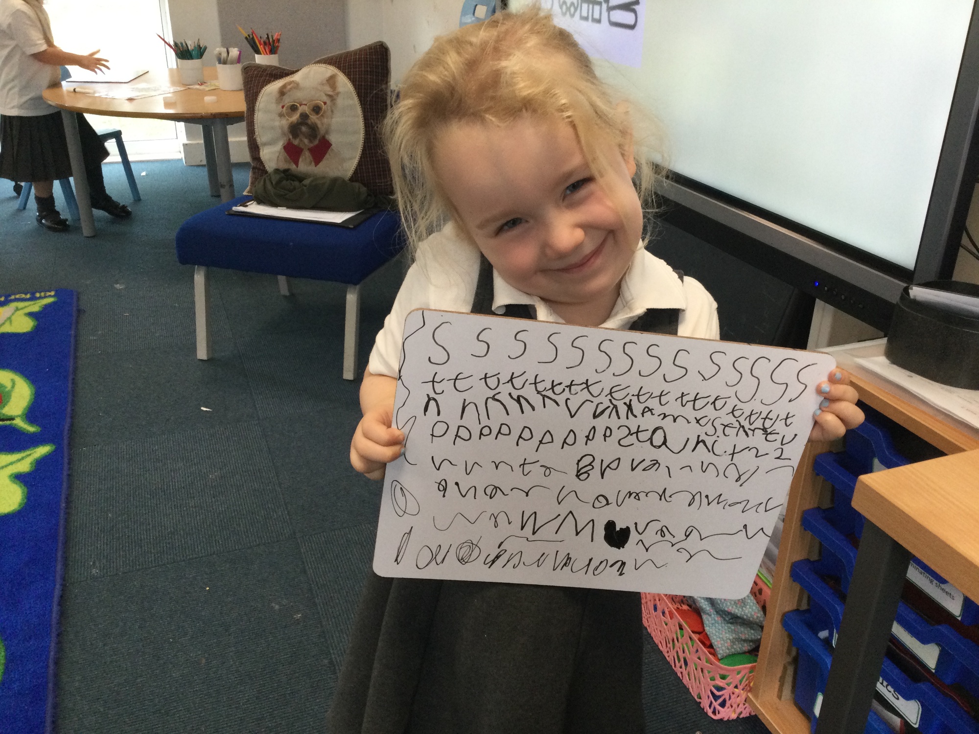 Child showing her letters